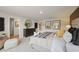 Comfortable bedroom featuring neutral tones, carpet flooring, and stylish furnishings at 2655 Mourning Dove Dr (Lot 50), Grayson, GA 30017