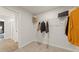 Walk-in closet with shelving and rods for organized storage at 2655 Mourning Dove Dr (Lot 50), Grayson, GA 30017