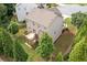 An elevated view of the home's backyard shows a deck and the manicured lawn at 432 Providence Walk St, Canton, GA 30114