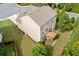 An aerial view shows the backyard, deck, lawn, and exterior of the house at 432 Providence Walk St, Canton, GA 30114