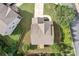 A beautiful home from above has a landscaped yard, long driveway, and attractive roof at 432 Providence Walk St, Canton, GA 30114