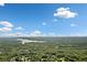 Expansive aerial view showcasing the lush landscape and the tranquil lake at 432 Providence Walk St, Canton, GA 30114