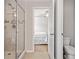 Bathroom with shower and view into the bedroom at 432 Providence Walk St, Canton, GA 30114