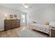 Bedroom featuring a ceiling fan and a dresser at 432 Providence Walk St, Canton, GA 30114