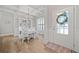 Bright dining room features a coffered ceiling, elegant chandelier, and stylish decor at 432 Providence Walk St, Canton, GA 30114