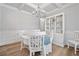 Elegant dining room features a coffered ceiling, a china cabinet, and a stylish table setting at 432 Providence Walk St, Canton, GA 30114