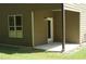 View of back patio area with door and window at 4417 Belcamp Rd, Fairburn, GA 30213