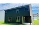 Exterior shot showing a two-story home with green siding and back patio at 4417 Belcamp Rd, Fairburn, GA 30213