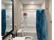 Clean bathroom featuring a shower-tub combo and neutral wall colors at 2433 Robin Ridge Dr, Dacula, GA 30019