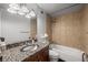 Bathroom with granite countertop, stainless steel sink, shower over tub and tile flooring at 2479 Peachtree Ne Rd # 301, Atlanta, GA 30305