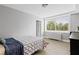 Bedroom features wood floors, natural light from window, and neutral wall paint at 2479 Peachtree Ne Rd # 301, Atlanta, GA 30305