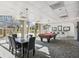 An entertainment room featuring a pool table, bar, and tables with chairs at 2479 Peachtree Ne Rd # 301, Atlanta, GA 30305