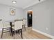 Cozy dining area with modern table set next to the open-concept kitchen at 2479 Peachtree Ne Rd # 301, Atlanta, GA 30305
