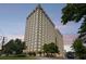 Striking exterior shot of building featuring a high-rise structure and manicured greenery at 2479 Peachtree Ne Rd # 301, Atlanta, GA 30305