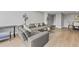 Spacious living room with modern furnishings, hardwood floors, and contemporary lighting fixtures at 2479 Peachtree Ne Rd # 301, Atlanta, GA 30305