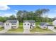 View of a community showcasing attractive two-story homes with well-maintained lawns at 1622 Palladian Way, Lithonia, GA 30058