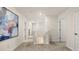 Upstairs hallway featuring doors, carpet, and natural light at 1622 Palladian Way, Lithonia, GA 30058