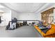 Open basement with window and decor, perfect for recreation at 195 Blackberry Run, Fayetteville, GA 30214