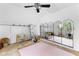 Bright bonus room featuring exercise space, natural light, and multiple mirrors at 195 Blackberry Run, Fayetteville, GA 30214