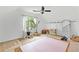 Bright bonus room featuring barn doors, lots of natural light, and space for exercise at 195 Blackberry Run, Fayetteville, GA 30214