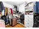 Walk-in closet features custom shelving, drawers, and ample hanging space at 195 Blackberry Run, Fayetteville, GA 30214