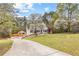 Beautiful home with lush trees and long driveway at 195 Blackberry Run, Fayetteville, GA 30214