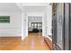 Inviting home entryway with hardwood floors, stylish decor, and a view into living space at 195 Blackberry Run, Fayetteville, GA 30214