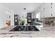 Bright kitchen showcasing a granite island with a gas cooktop at 195 Blackberry Run, Fayetteville, GA 30214