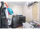 Functional laundry room equipped with modern appliances and storage solutions at 195 Blackberry Run, Fayetteville, GA 30214
