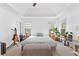 Spacious main bedroom featuring tray ceilings and carpet, perfect for relaxation at 195 Blackberry Run, Fayetteville, GA 30214