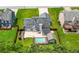 Backyard boasts an in-ground pool and a spacious patio perfect for entertaining at 314 Spring Falls Drive, Lawrenceville, GA 30045