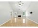 Inviting living area featuring neutral paint, ample natural light and a fireplace at 314 Spring Falls Drive, Lawrenceville, GA 30045