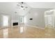 Bright living room with a fireplace, vaulted ceilings, and tile floors at 314 Spring Falls Drive, Lawrenceville, GA 30045