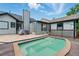 Backyard with inviting in-ground pool, wood deck, and patio at 314 Spring Falls Drive, Lawrenceville, GA 30045