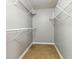 Walk-in closet with wire shelving and tile floor at 314 Spring Falls Drive, Lawrenceville, GA 30045