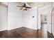 Spacious room with hardwood floors and a ceiling fan with exposed ductwork above at 320 Martin Luther King Jr Se Dr # 9, Atlanta, GA 30312