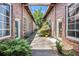 Charming courtyard featuring brick buildings, walkway, plants, and natural light at 320 Martin Luther King Jr Se Dr # 9, Atlanta, GA 30312