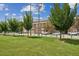 A striking brick building, lush greenery, and streetscape showcase this mixed-use property at 320 Martin Luther King Jr Se Dr # 9, Atlanta, GA 30312