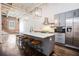 Stylish kitchen with a large island, stainless steel appliances, and gray cabinets at 320 Martin Luther King Jr Se Dr # 9, Atlanta, GA 30312
