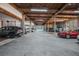 Large parking garage with multiple cars and exposed brick walls at 320 Martin Luther King Jr Se Dr # 9, Atlanta, GA 30312
