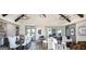 Open-concept living and dining space featuring modern decor and ample natural light at 3351 Orwell Way # 2301, Cumming, GA 30041