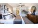 Stylish main bedroom with a comfy bed, dresser, decor, and a ceiling fan at 3351 Orwell Way # 2301, Cumming, GA 30041