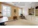 Bedroom featuring two large windows for ample lighting, and built-in storage at 3770 Wake Robin Way, Cumming, GA 30028