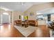 Spacious living room with a high ceiling, fireplace and hardwood floors at 3770 Wake Robin Way, Cumming, GA 30028