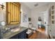 Well-appointed bathroom with a unique vanity, vessel sink, and storage, showcasing rustic charm at 92 Old Ivy Ne Rd # 6, Atlanta, GA 30342
