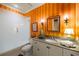 Stylish bathroom featuring a glass-enclosed shower, vanity with sink, and bold striped wallpaper at 92 Old Ivy Ne Rd # 6, Atlanta, GA 30342