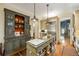 Spacious kitchen with a large island, custom cabinetry, and modern stainless steel appliances at 92 Old Ivy Ne Rd # 6, Atlanta, GA 30342