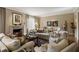 Bright living room featuring a fireplace, plush seating, and stylish decor at 92 Old Ivy Ne Rd # 6, Atlanta, GA 30342