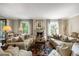 Inviting living room with neutral tones, a cozy fireplace, and ample seating at 92 Old Ivy Ne Rd # 6, Atlanta, GA 30342