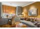 Cozy office space with custom built-ins, desk, and a comfortable sofa for relaxation and work at 92 Old Ivy Ne Rd # 6, Atlanta, GA 30342